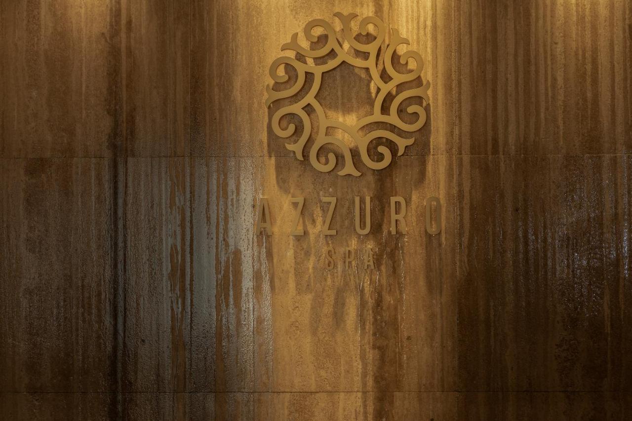 Chrysomare Beach Hotel & Resort Ayia Napa Esterno foto The 7ZUR logo