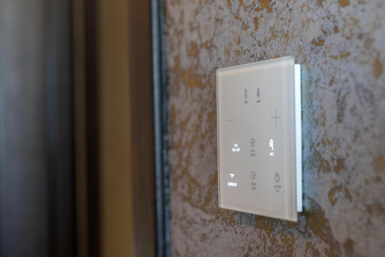 Chrysomare Beach Hotel & Resort Ayia Napa Esterno foto A smart home thermostat