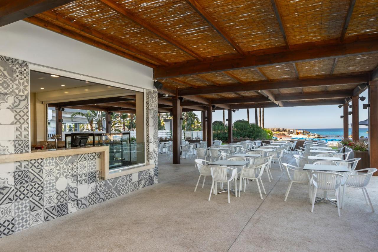 Chrysomare Beach Hotel & Resort Ayia Napa Esterno foto The restaurant at the beach